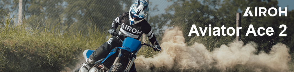 Airoh Helme - Mann auf Crossmotorrad auf Rennstrecke mit Airoh Aviator Ace 2 Helm