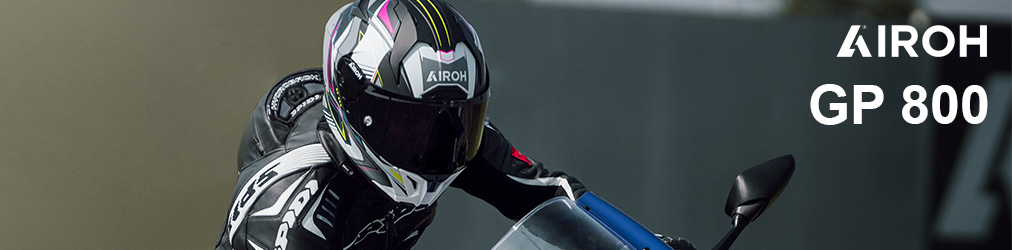 Airoh Helme - Mann auf Motorrad auf Rennstrecke mit Airoh GP 800 Helm